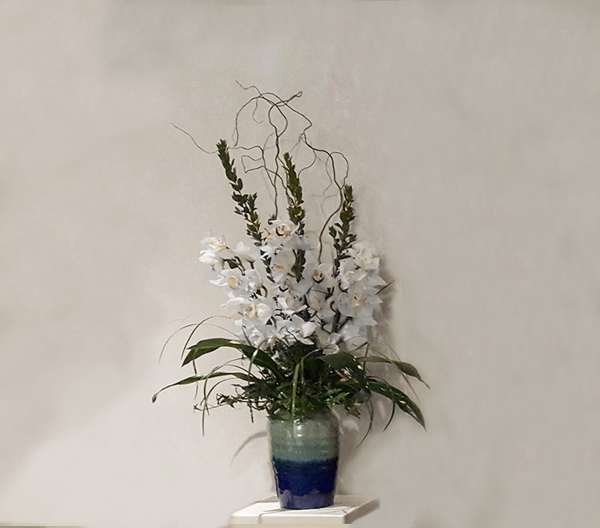 Cymbidium Orchid In Ceramic Vase